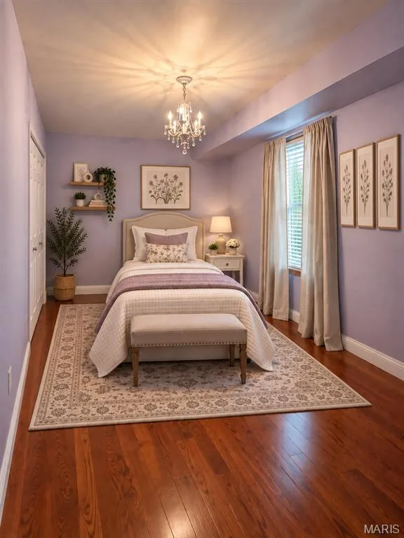 Wood-finish flooring, recessed lighting, and a crystal chandelier, staged virtually — 3 Fairfax Drive, St Peters, MO 63376