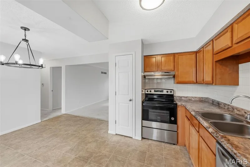 Great cabinet space for your kitchen with a pantry — 773 Delray Drive #D, St Peters, MO 63376