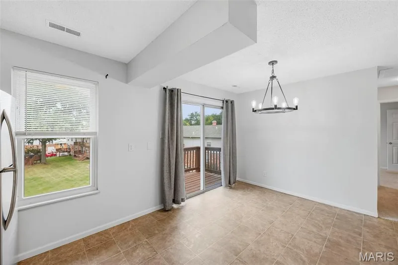 Sliding glass doors to balcony — 773 Delray Drive #D, St Peters, MO 63376
