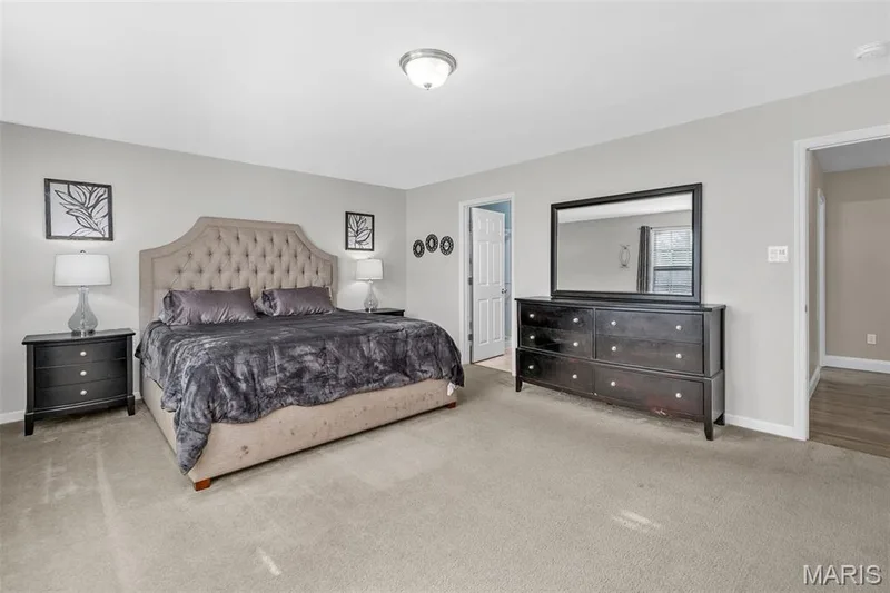 Carpeted flooring, neutral wall palette, and overhead lighting — 543 Country Chase Drive, Lake St. Louis, MO 63367