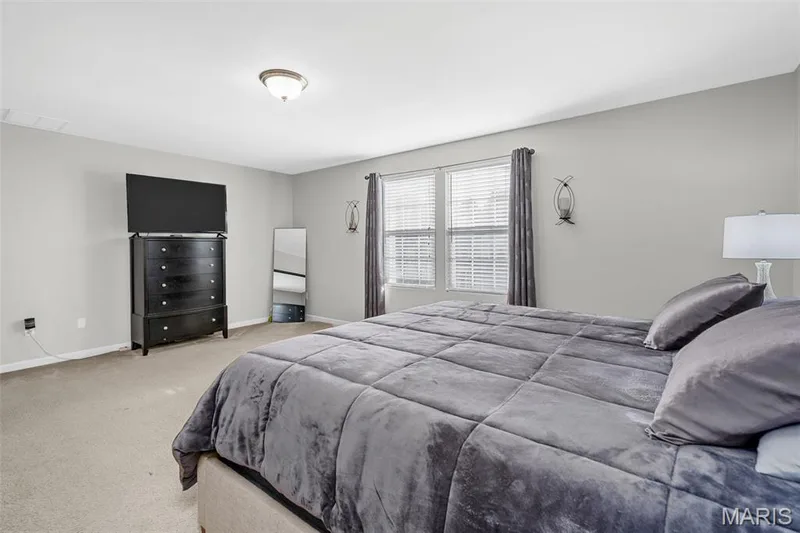 Recessed lighting, light gray walls, and dual windows with blinds — 543 Country Chase Drive, Lake St. Louis, MO 63367