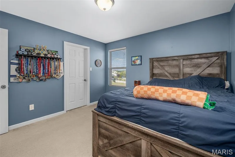 Recessed lighting, light-colored carpeting, and a window with horizontal blinds — 543 Country Chase Drive, Lake St. Louis, MO 63367