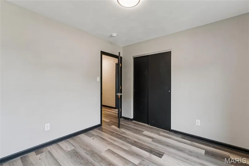 Wood-finish flooring with grey wall paint — 2801 Droste Road, St Charles, MO 63301