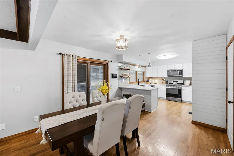 Breakfast Room has access to Laundry room on the right and backyard via slider door on the left — 416 Morningside Drive, St Peters, MO 63376