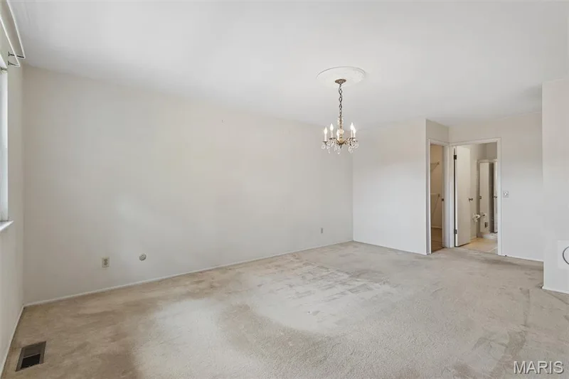 Recessed lighting, chandelier with decorative ceiling medallion, and carpeted flooring — 1192 Cantina Drive, Chesterfield, MO 63141