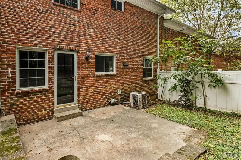 Secluded backyard with privacy fencing and large patio — 1192 Cantina Drive, Chesterfield, MO 63141