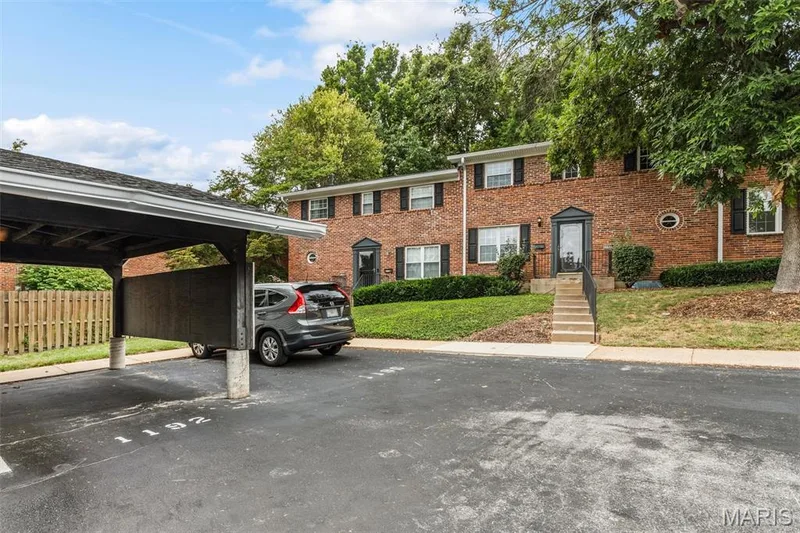 Covered carport with dedicated parking. Unit also comes with second dedicated parking space. — 1192 Cantina Drive, Chesterfield, MO 63141