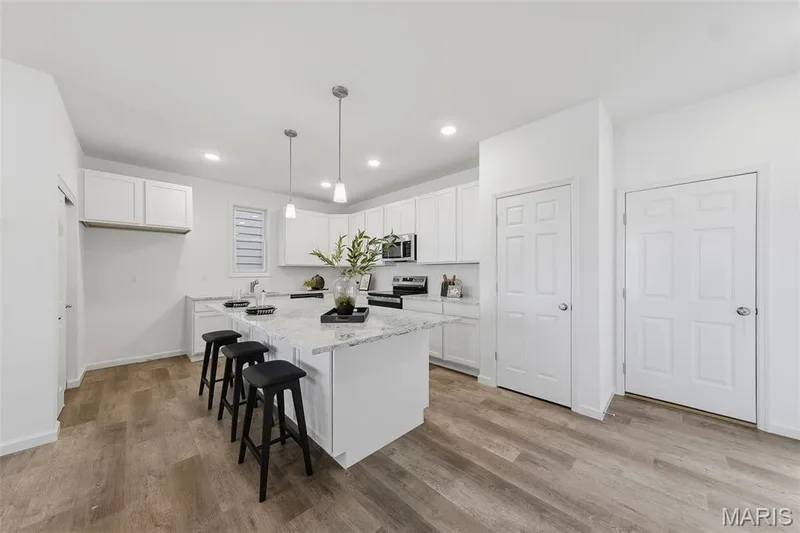 Lots of white cabinetry! — 9019 Wilkie Station Street, St Charles, MO 63301