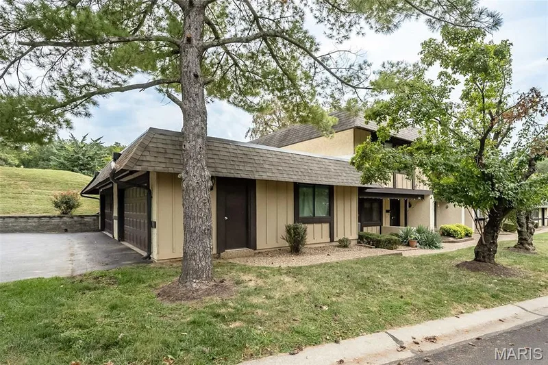 2 car garage leads directly into the home (back garage). — 1368 Hampton Road #A, St Charles, MO 63303