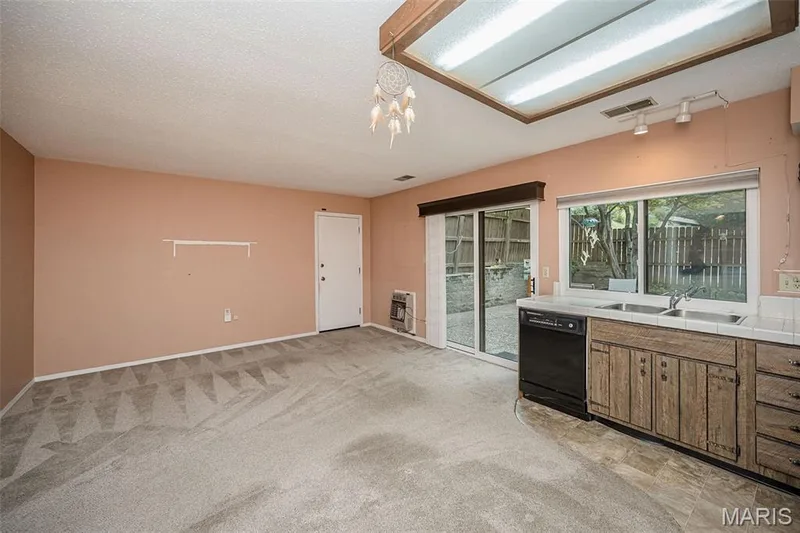 Garage leads into the bonus space off the kitchen. — 1368 Hampton Road #A, St Charles, MO 63303