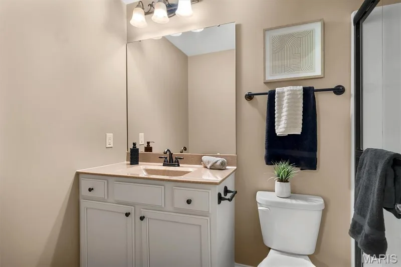 Vanity with undermount sink, countertop, and matte black hardware — 56 Huntleigh Park Court, Wentzville, MO 63385