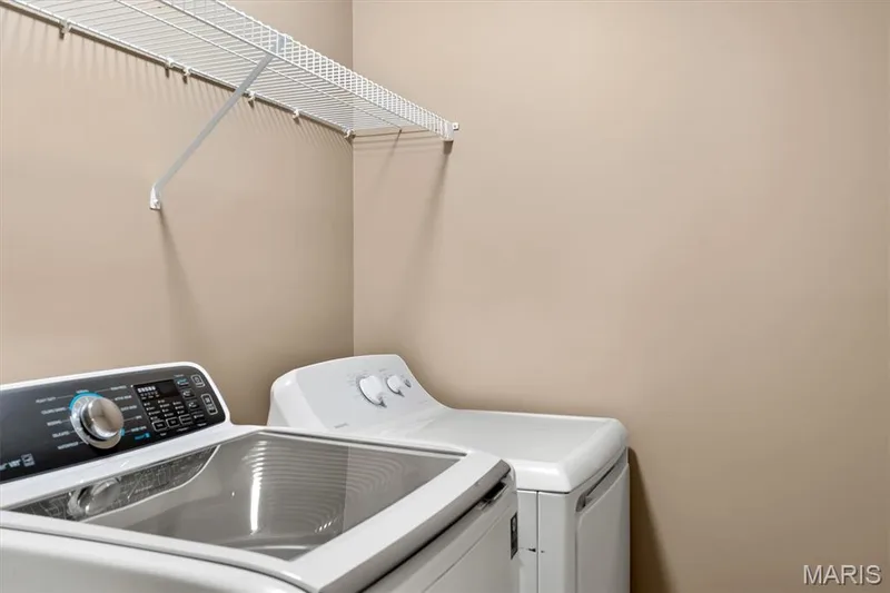 White wire shelving with a support bracket — 56 Huntleigh Park Court, Wentzville, MO 63385
