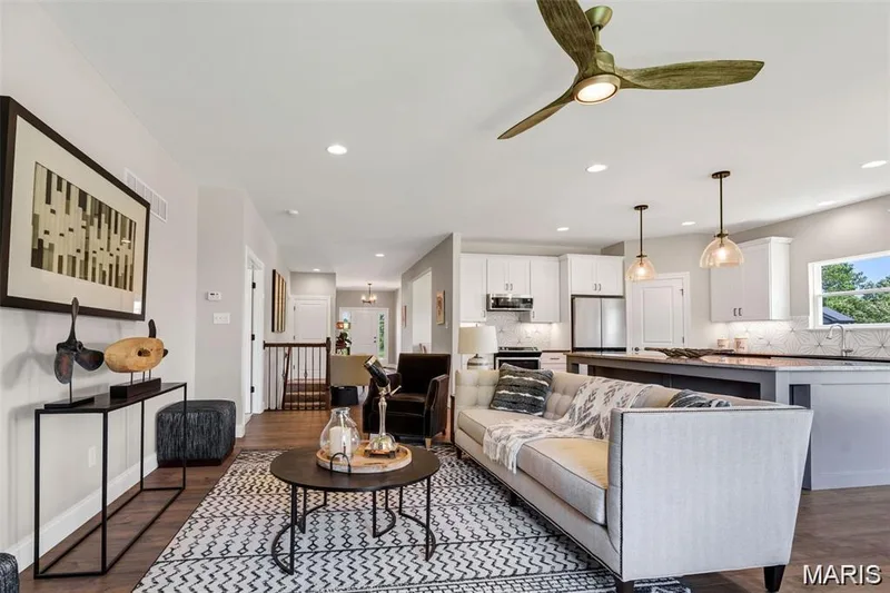 Spacious Great Room. Photo from a previously completed home. — 1 Grand Columbia, O'Fallon, MO 63366
