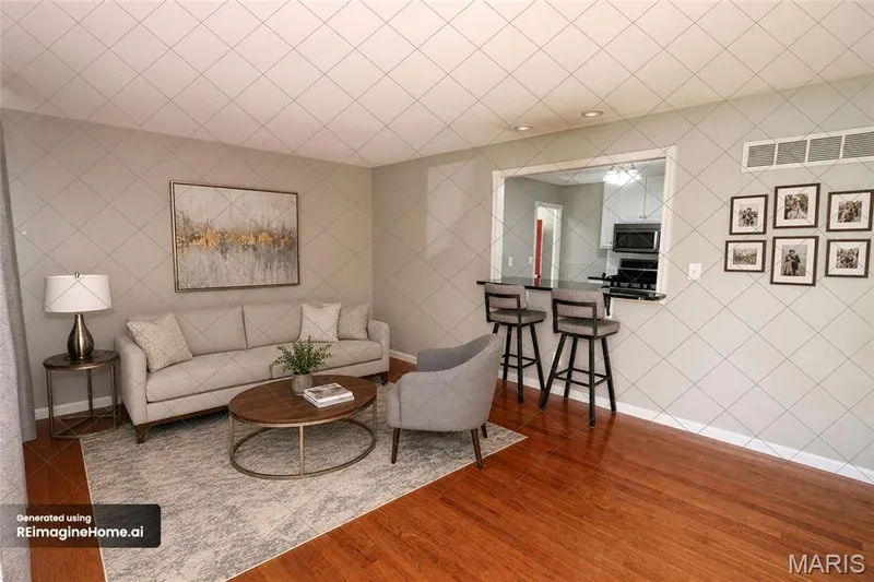 VIRTUAL FAMILY ROOM - Hardwood flooring, neutral painted walls, and a pass-through window with a breakfast bar — 3 Oxbow Road, St Peters, MO 63376