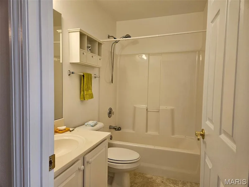 Built-in shower/tub combination with chrome fixtures — 1129 Piepers Glen Lane #8A, O'Fallon, MO 63366