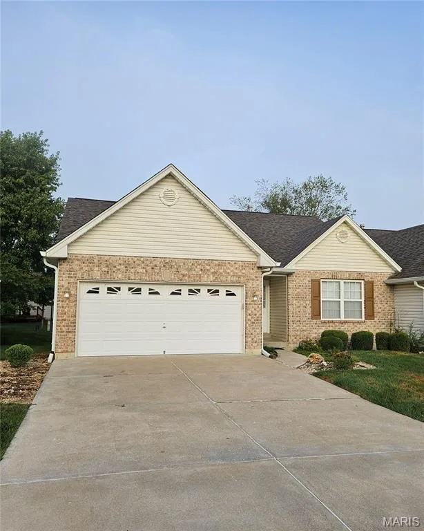 Brick and siding exterior with a gabled roofline — 1129 Piepers Glen Lane #8A, O'Fallon, MO 63366