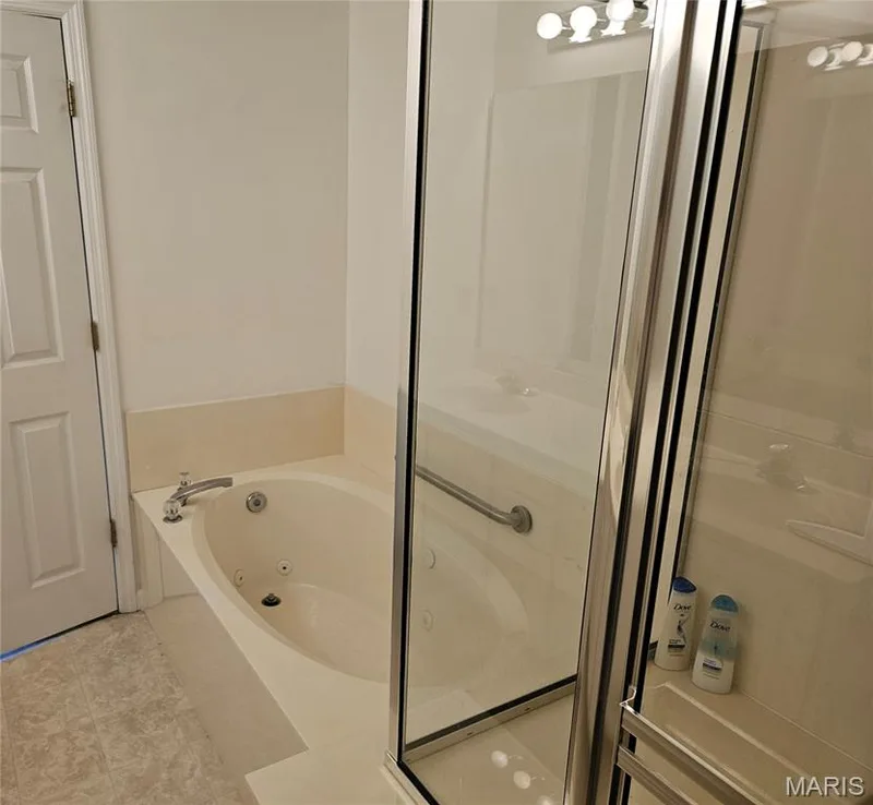 Built-in jetted tub with deck-mounted faucet — 1129 Piepers Glen Lane #8A, O'Fallon, MO 63366