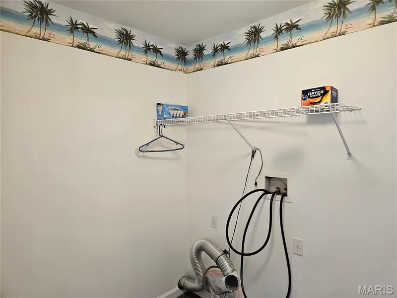 Wall-mounted shelving system, utility connections, and wood-finish flooring — 1129 Piepers Glen Lane #8A, O'Fallon, MO 63366