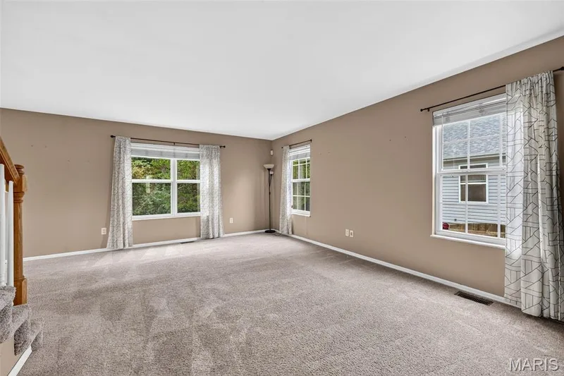 Natural light flows through the main floor. — 1033 Providence Pointe Drive, Wentzville, MO 63385
