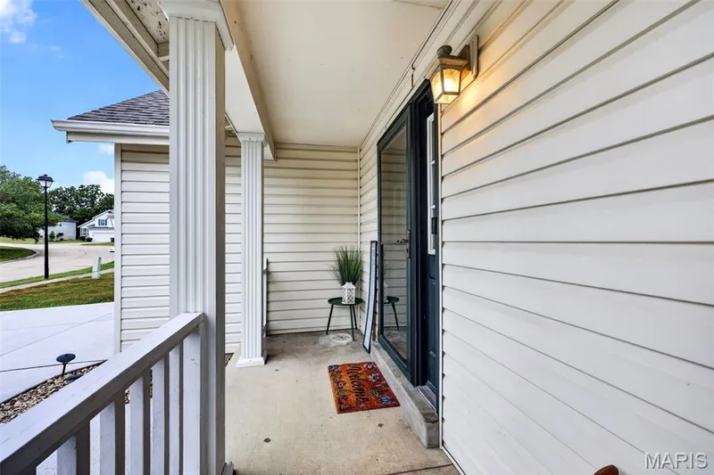This front porch is just begging for a rocking chair. — 1033 Providence Pointe Drive, Wentzville, MO 63385