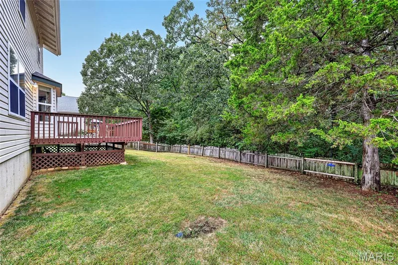 The yard is wonderful! It backs to trees, making it feel very private and peaceful. — 1033 Providence Pointe Drive, Wentzville, MO 63385