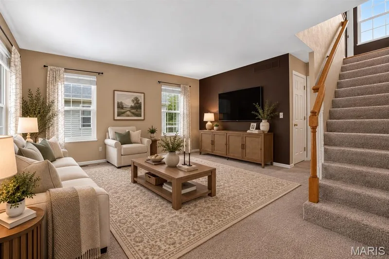 The layout is perfect for your large couch and flatscreen! — 1033 Providence Pointe Drive, Wentzville, MO 63385
