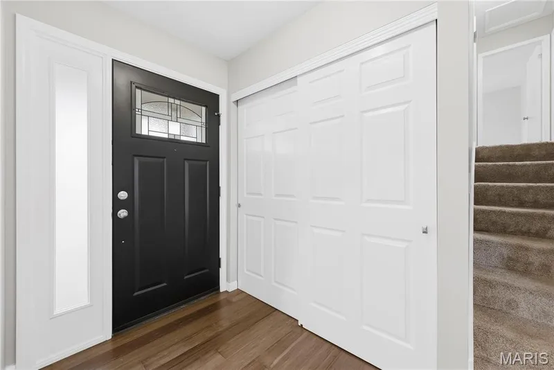 BEAUTIFUL Designer Leaded Glass Front Door with Privacy Glass Sidelight!  Full Size Coat Closet is just the right size! — 27 Oak Valley Drive, St Peters, MO 63376