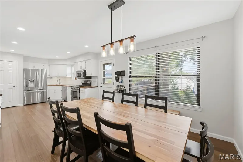 Designer Lighting & JUST PERFECT for a LARGE TABLE to Gather Around! — 27 Oak Valley Drive, St Peters, MO 63376