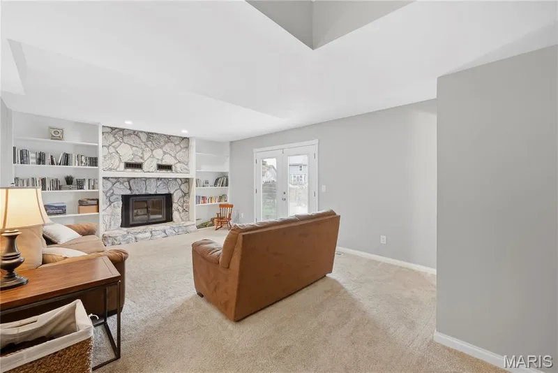 You will LOVE the Family Room with the Stone Wood Burning Fireplace & Built-In Bookshelves! — 27 Oak Valley Drive, St Peters, MO 63376