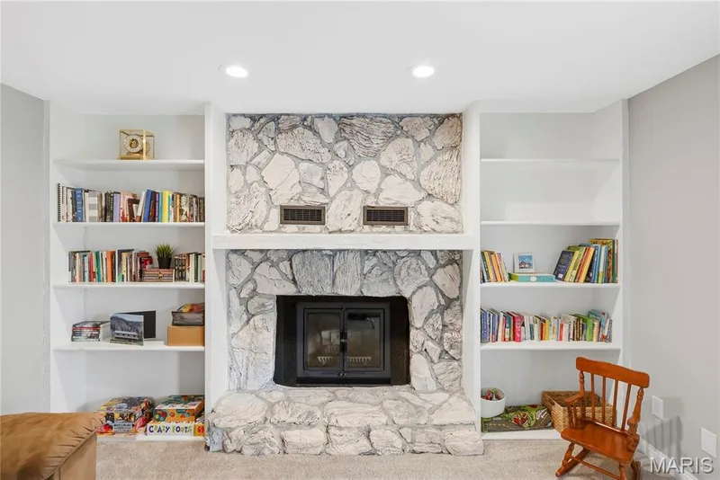 Imagine how you can decorate & use these WONDERFUL Built-In Bookshelves and time spent around the Fireplace! — 27 Oak Valley Drive, St Peters, MO 63376
