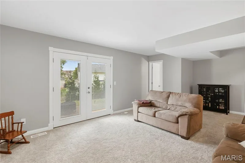 The Family Room features a convenient Half Bath too! — 27 Oak Valley Drive, St Peters, MO 63376