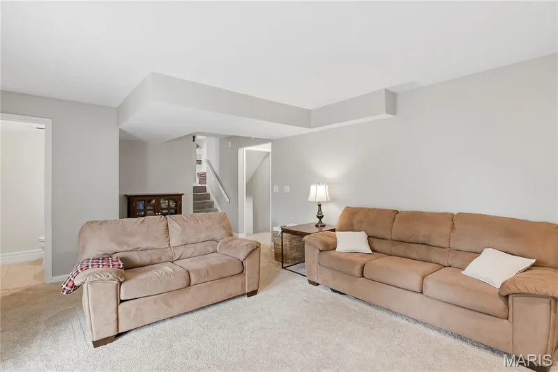 A short flight of steps leads to the Main Level & there is a short flight of steps leading to the Partially Finished Walk-Out Basement! — 27 Oak Valley Drive, St Peters, MO 63376