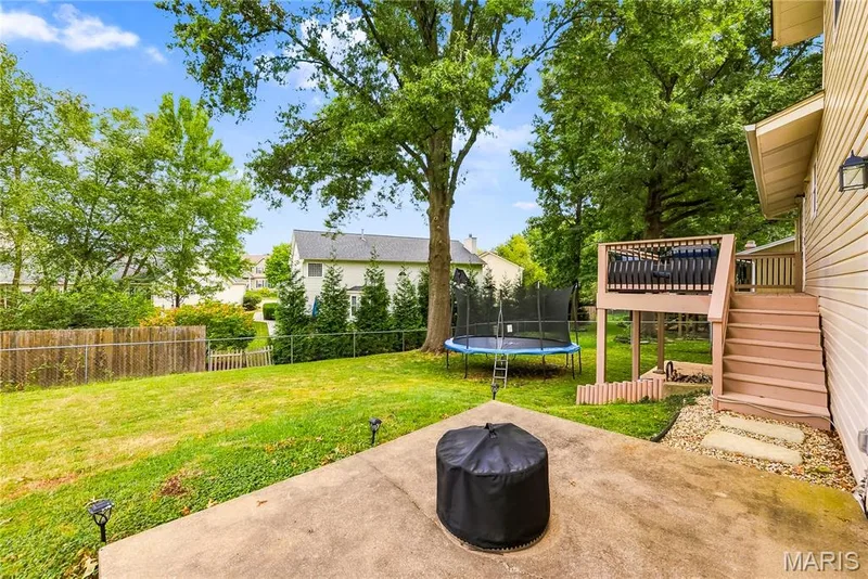 The Composite Deck has a short flight of Stairs to the Patio that is ready for you to ENJOY! — 27 Oak Valley Drive, St Peters, MO 63376
