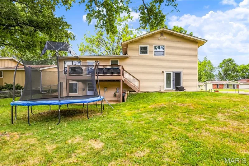 This home offers so many opportunities to access the MOSTLY LEVEL Fenced Backyard! — 27 Oak Valley Drive, St Peters, MO 63376