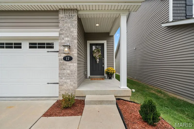 Front entry with a covered front porch. — 17 Rydal Place, St Charles, MO 63303