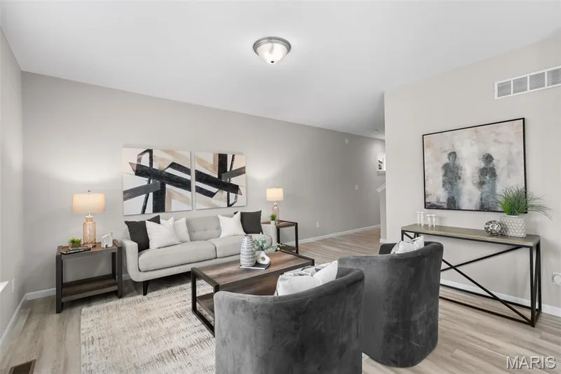 Natural light really brings the cozy feeling to the living room. — 17 Rydal Place, St Charles, MO 63303