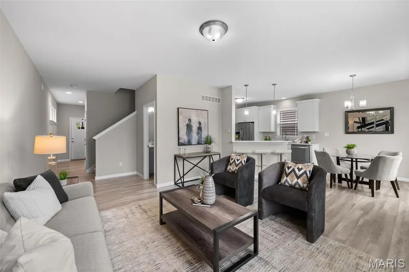 Kitchen/dining combination that opens to the spacious living area — 17 Rydal Place, St Charles, MO 63303
