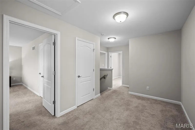 landing area that could be an office, book nook or extra gathering space — 17 Rydal Place, St Charles, MO 63303