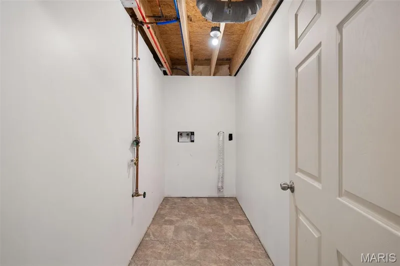 Laundry room in the lower level — 17 Rydal Place, St Charles, MO 63303