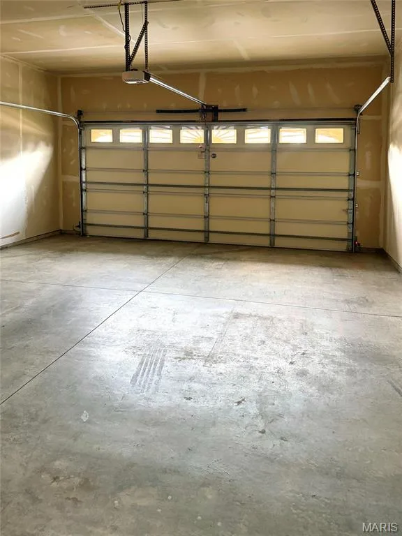 oversized two car garage — 213 Woodland Place Court, St Charles, MO 63303