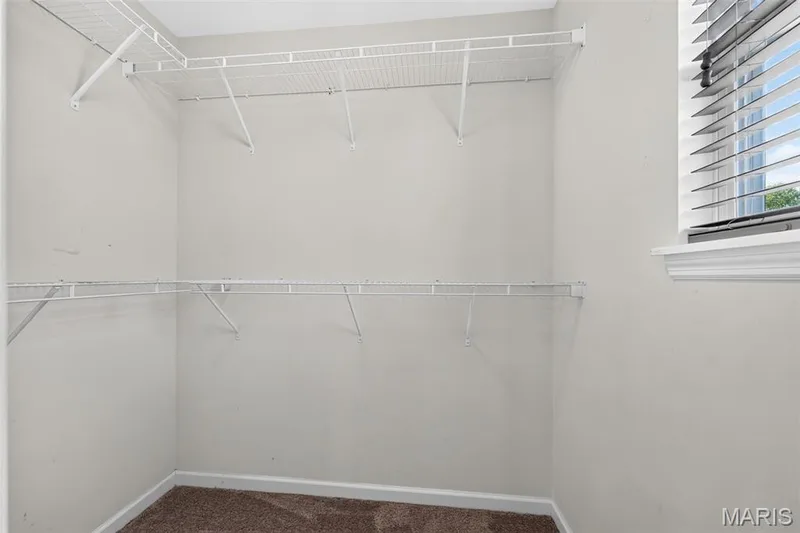 Walk in closet in primary bedroom — 3213 Camp Street, St Charles, MO 63301