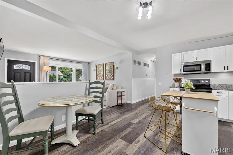 Dining area between the kitchen and living room — 34 Highland Drive, St Charles, MO 63303