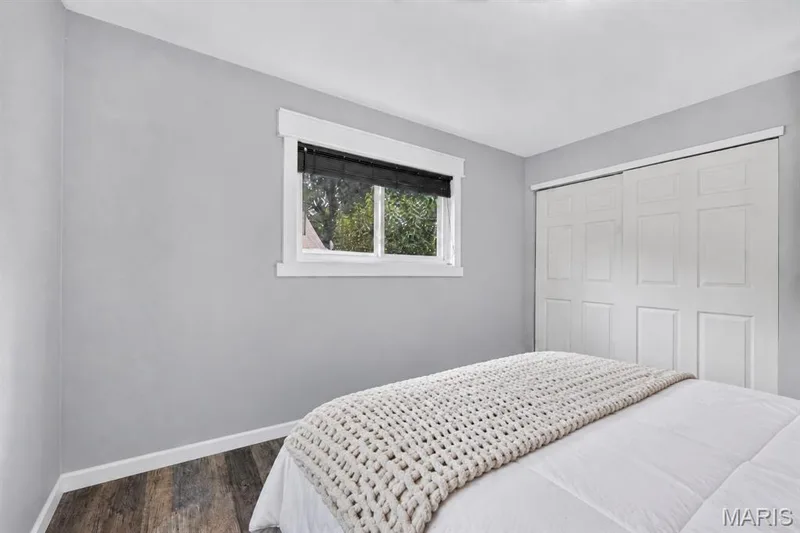 Bedroom with sliding closet doors — 34 Highland Drive, St Charles, MO 63303