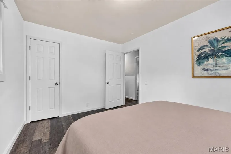 Bedroom with white six-panel doors — 34 Highland Drive, St Charles, MO 63303