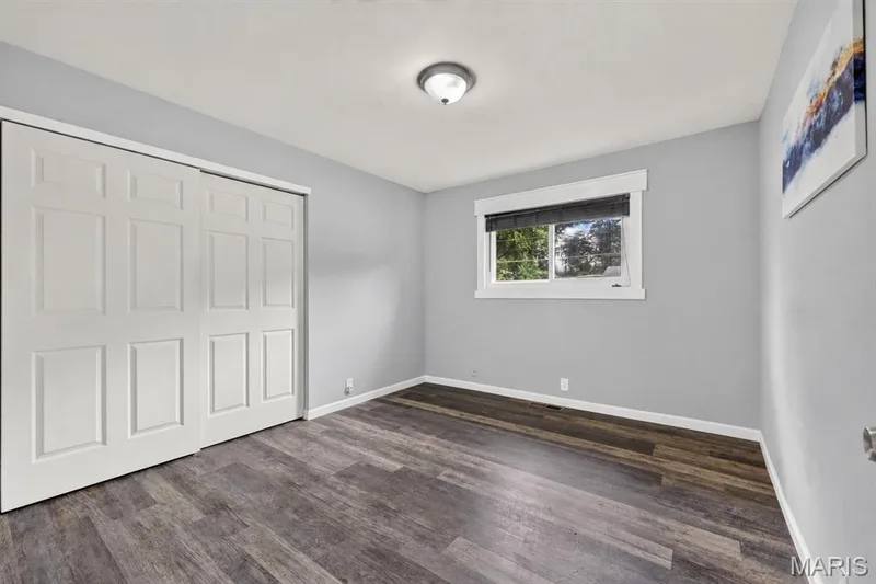 Bedroom with sliding closet doors — 34 Highland Drive, St Charles, MO 63303