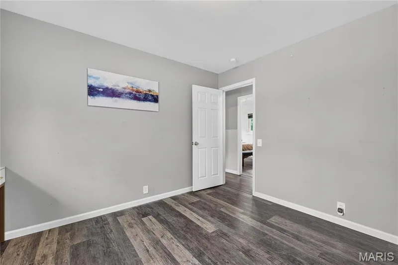 Bedroom with luxury vinyl flooring — 34 Highland Drive, St Charles, MO 63303