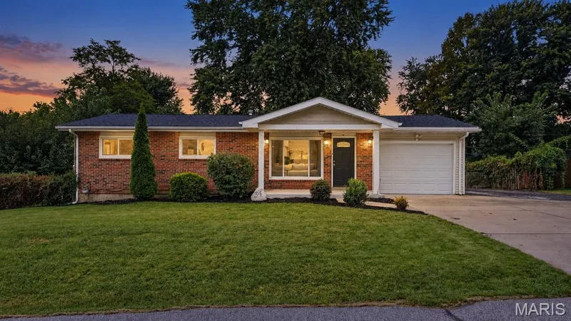 Brick ranch at twilight — 34 Highland Drive, St Charles, MO 63303