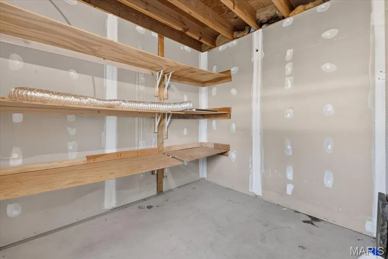 Laundry area has room for storage & is securable — 885 Delray Drive #H, St Peters, MO 63376