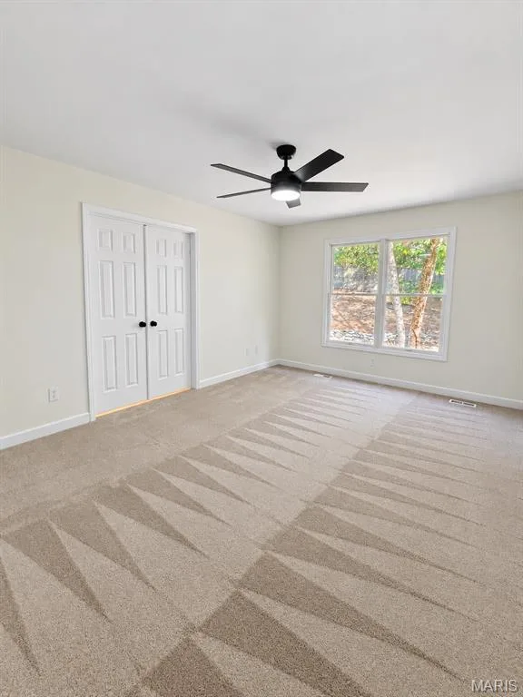 Light-toned walls complement plush carpeting — 1731 Fairview Farms Circle, Wentzville, MO 63385