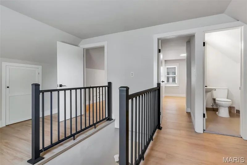 Upper-level flex space with two bedrooms and half bath. — 1165 Jackson Street, St Charles, MO 63301
